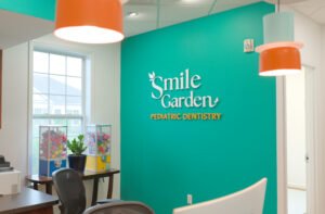 smile garden logo sign in office